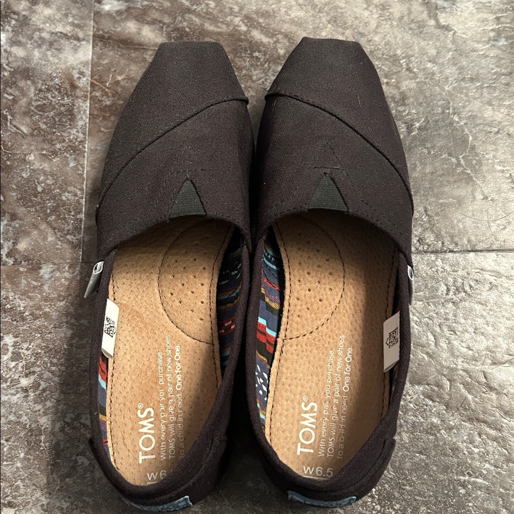 TOMS Classic Black Canvas Slip-Ons
